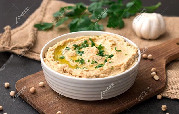 how is hummus made in factories